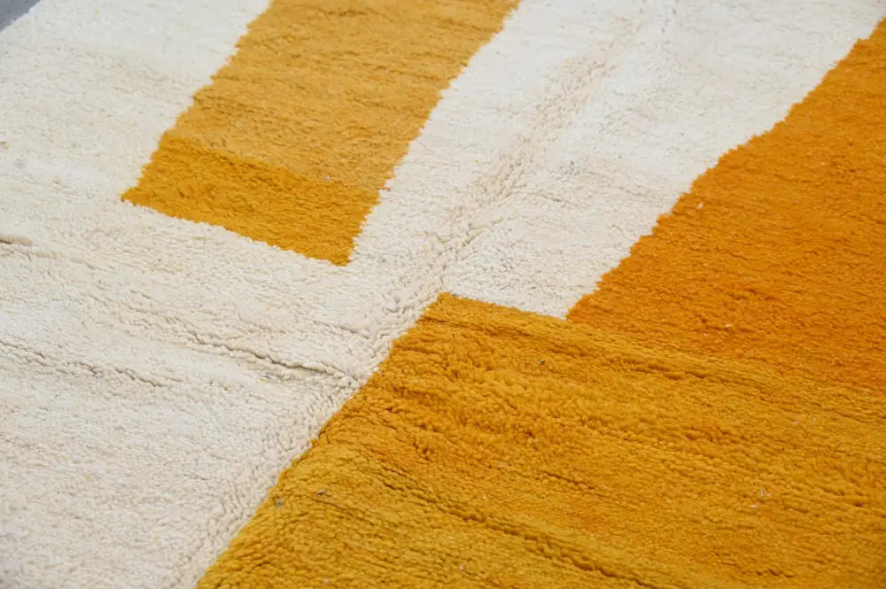 A decorbites™ handmade traditional azilal rug 250x149 cm with bold geometric cream and mustard yellow stripes