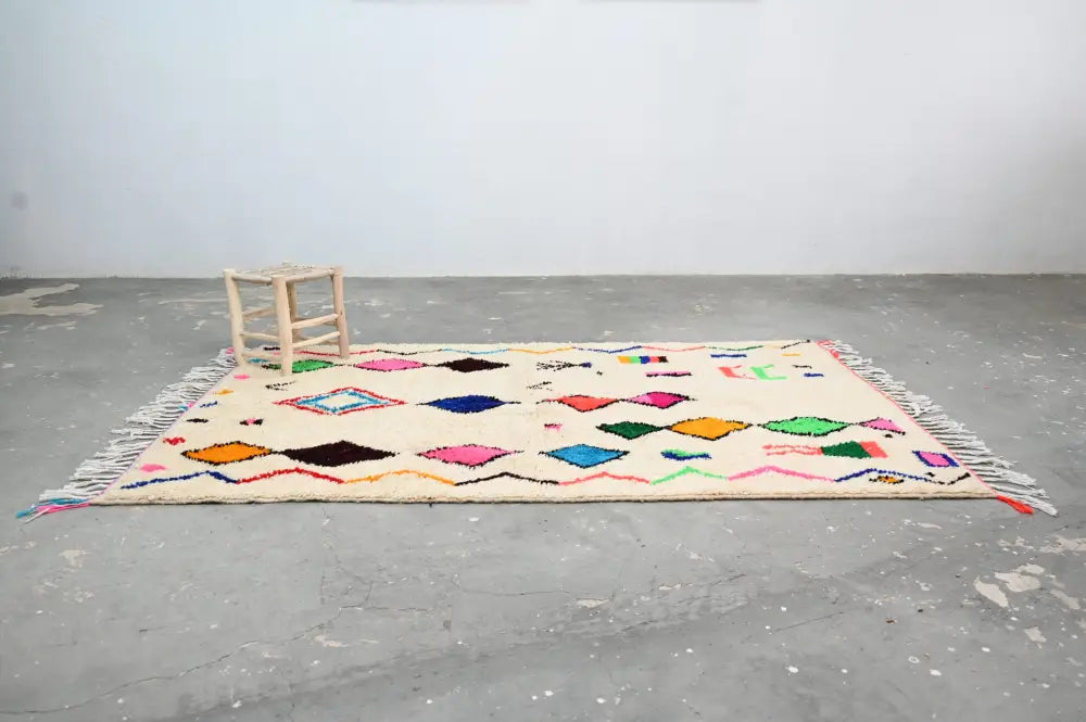 Beige decorbites handmade moroccan azilal rug 250x160cm with colorful geometric patterns natural wool fringe edges