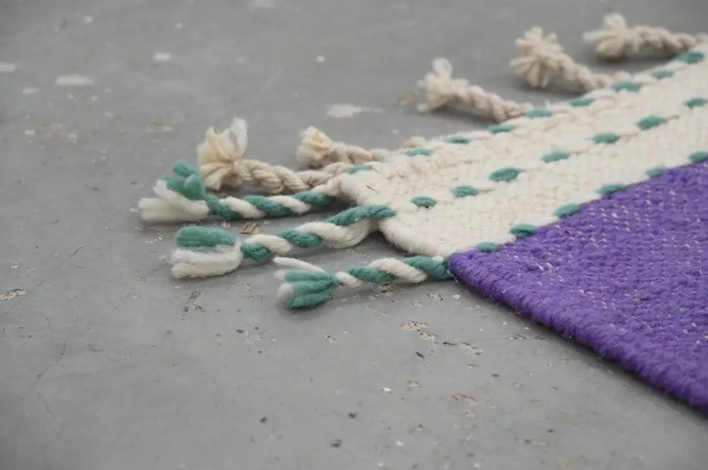 DecorBites™ handmade Moroccan azilal rug 294x175 cm with cream teal woven pattern purple fabric and braided tassels