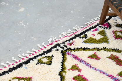 DecorBites™ handmade moroccan azilal rug 302x197 cm with cream color and olive green magenta geometric patterns