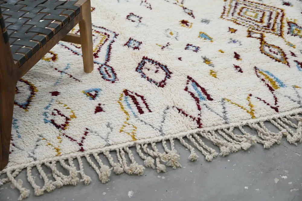 Decorbites™ handmade moroccan azilal rug 305x206cm features a cream geometric pattern in burgundy blue and mustard with fringe