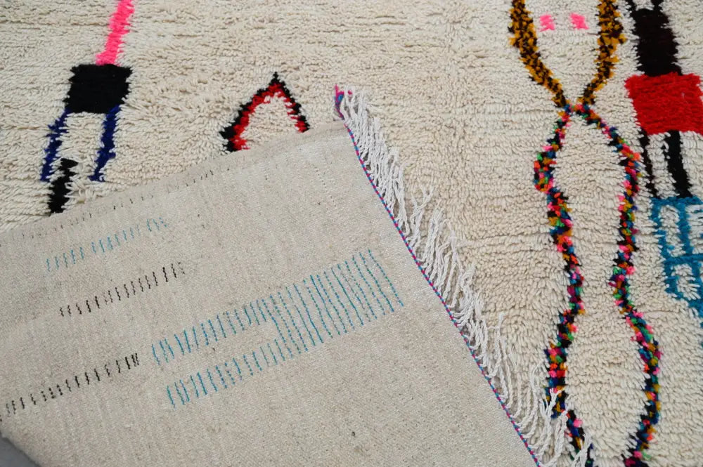Beige decorbites™ handmade moroccan azilal rug with colorful geometric patterns and fringed edges 313x194cm