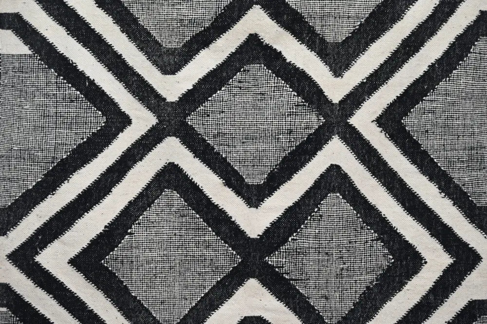 Black and white geometric patterned handmade traditional azilal rug with woven texture by decorbites 326x203 cm