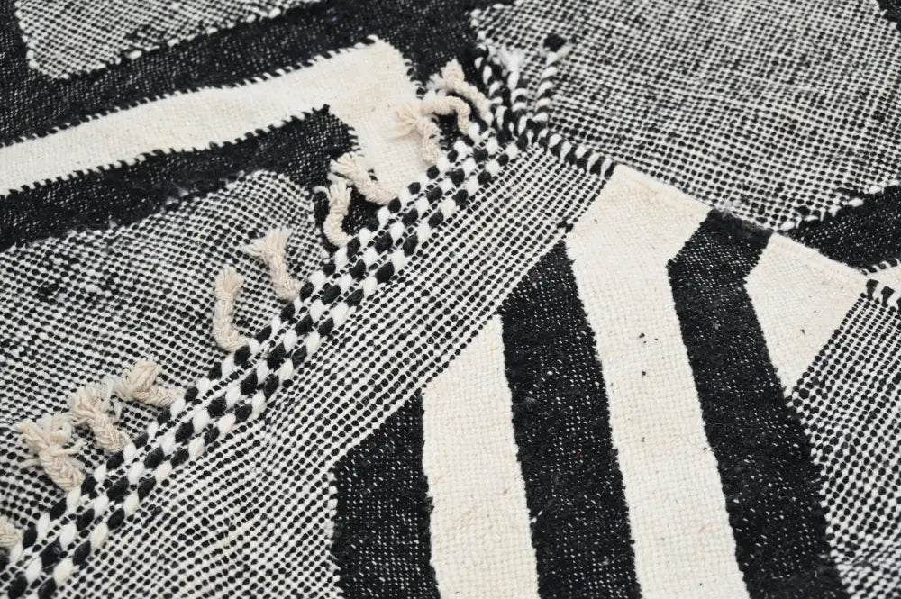 DecorBites handmade traditional azilal rug in black and white geometric pattern with fringed edges 326x203 cm
