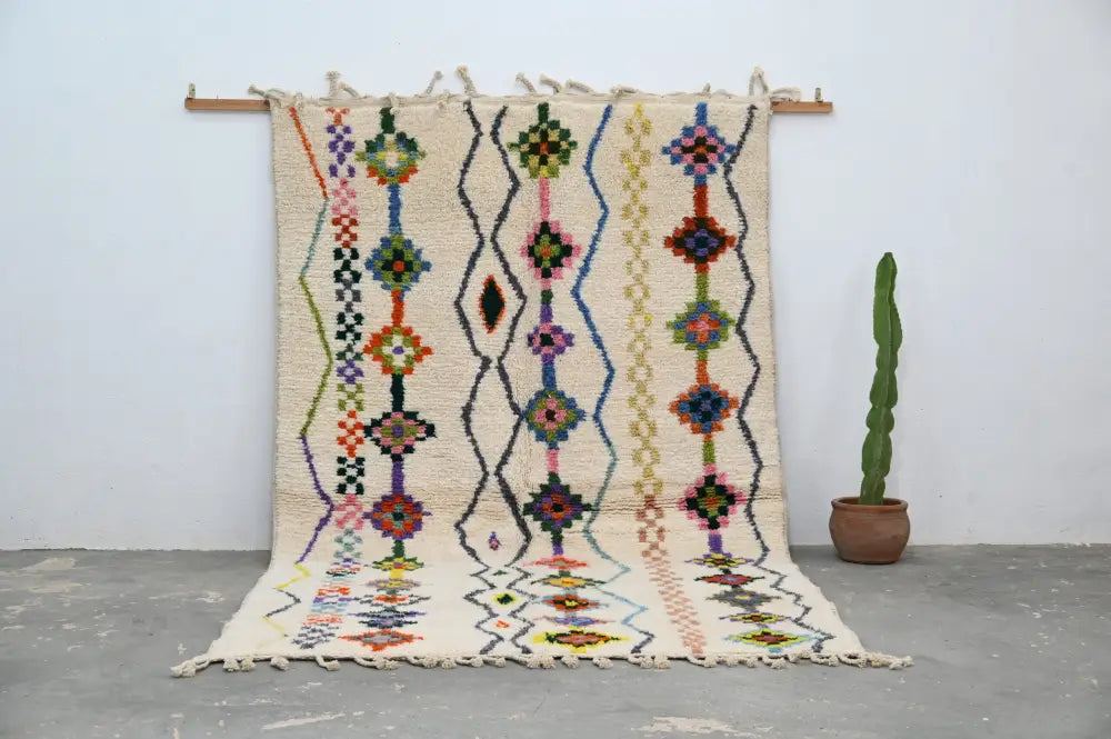 Beige handmade decorbites™ traditional azilal rug with colorful geometric patterns and fringed edges 315x194cm