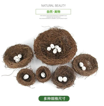 Brown intricately woven rattan bird nests of varying sizes each containing white speckled eggs by decorbites™