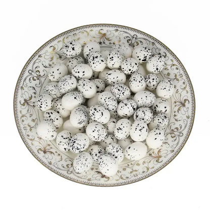 Decorbites™ handmade round rattan bird nest decoration with white speckled egg-shaped candies in a porcelain bowl