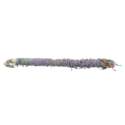 A bundle of multicolored cords in purple blue green and beige for handmade weaving macrame wall hanging decor