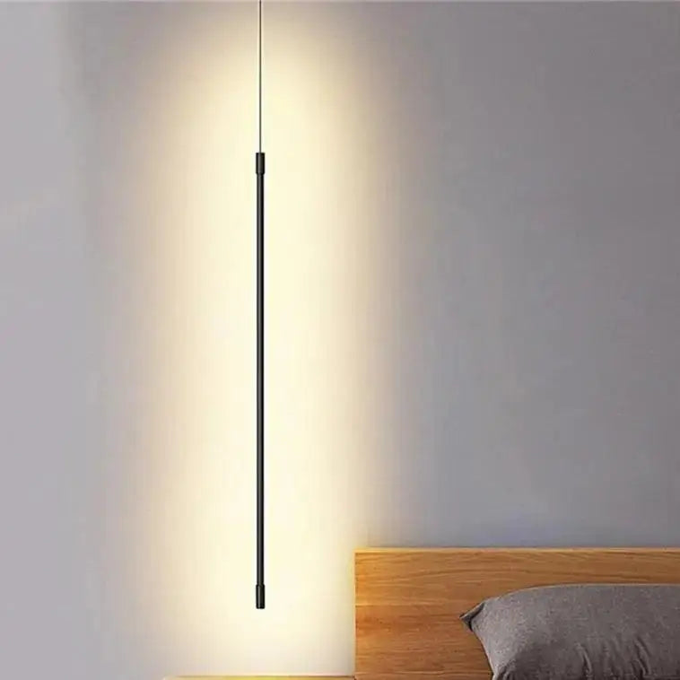DecorBites™ black minimalist hanging pendant lights with sleek cylindrical design and warm ambient glow for bedroom