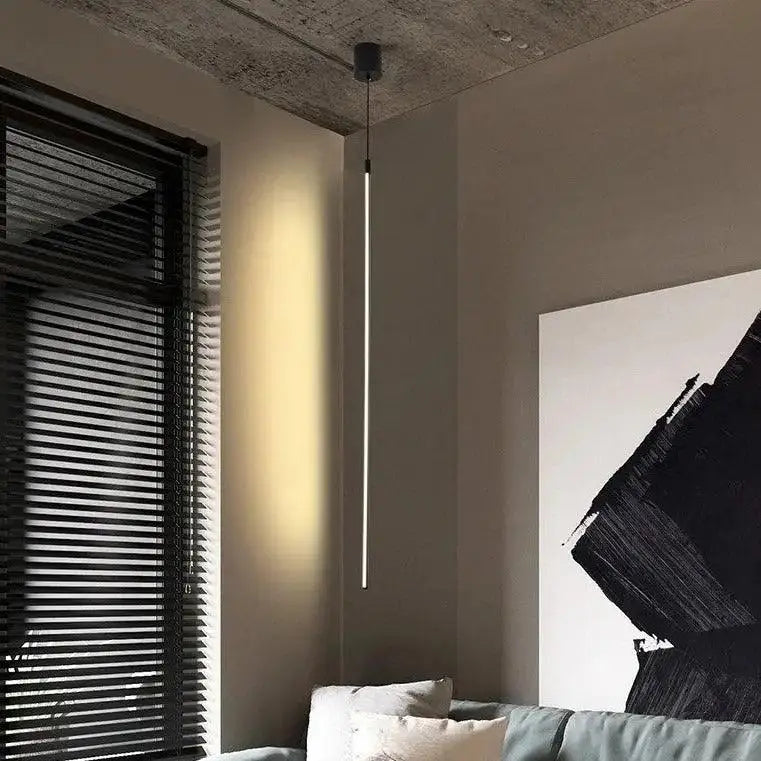 DecorBites™ hanging pendant lights with matte black fixture and slender white tube for bedroom lighting