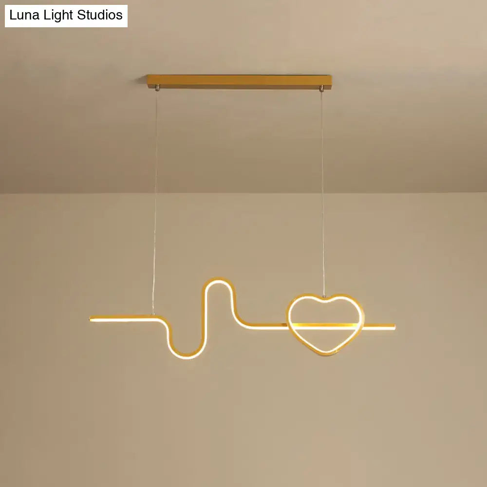 Gold-toned metal led pendant light shaped like an electrocardiogram line ending in a heart for dining room use