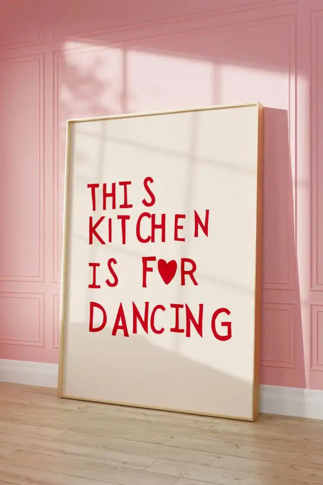 Framed DecorBites™ wall art with bold heart red quote on cream background in light wooden frame for kitchen decor