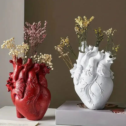 DecorBites™ heart shape resin vase in red and white with dried flowers showcasing detailed anatomical design