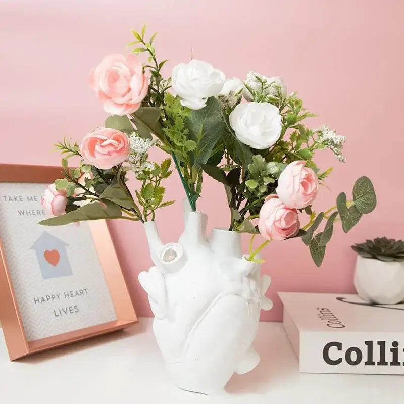 White ceramic heart shape resin vase with realistic anatomical details from DecorBites in 4 colors