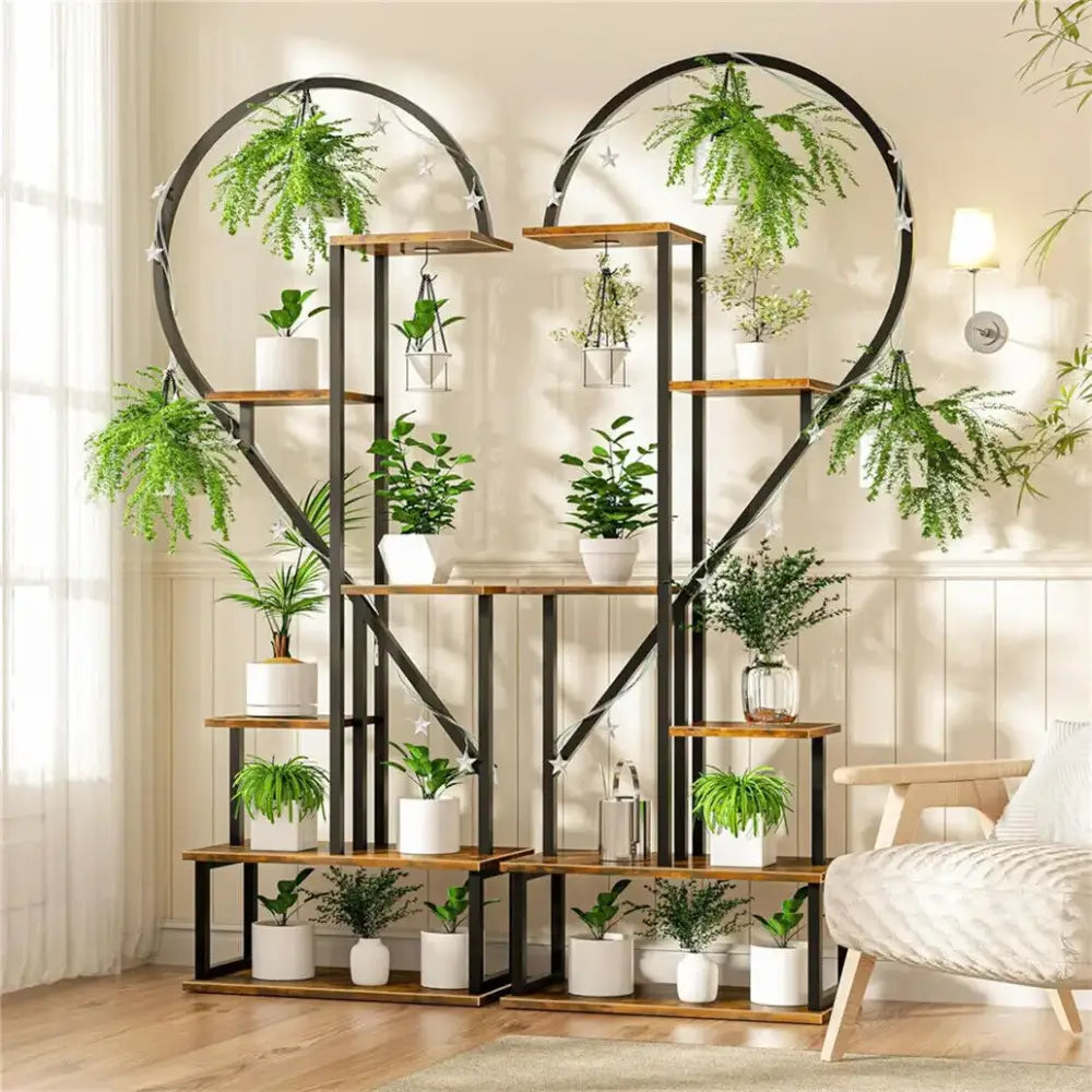 Decorbites™ heart shaped metal and wood plant stand with multiple shelves holding potted green plants