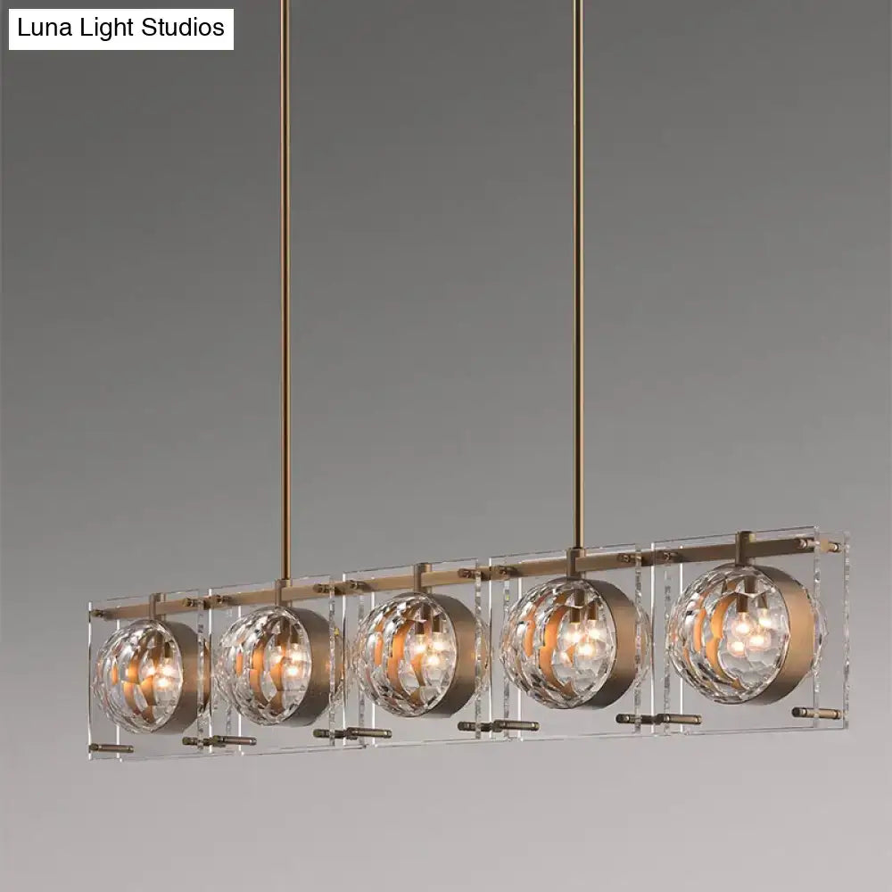 DecorBites™ hexagon glass ball pendant lamp with five faceted crystal globes and brass finish island light fixture