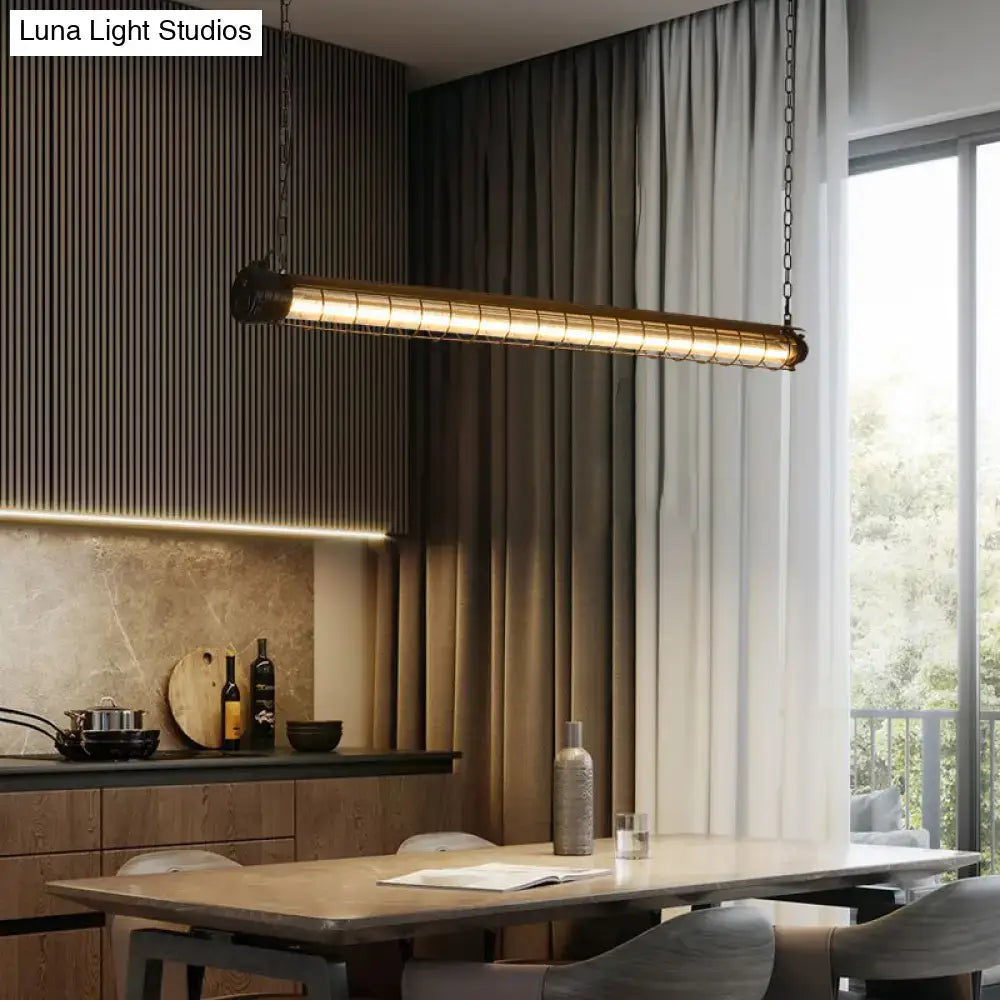 Industrial-style brass tubular cage dining pendant light with ribbed design and chain suspension for dining room ceiling