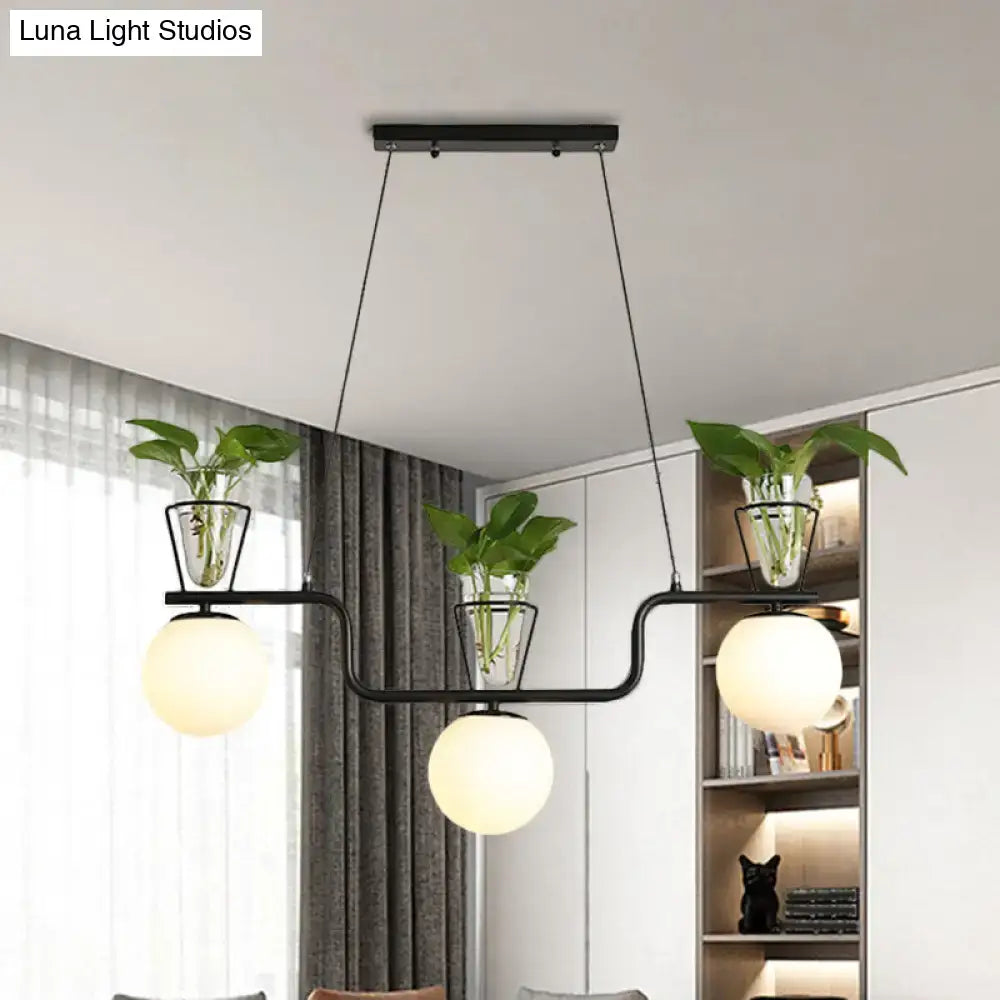 Decorbites industrial black metal pendant light with opal glass globes and clear glass pot plant holders