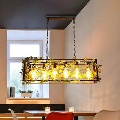 Decorbites industrial cage metal pendant light with black frame and green imitation leaf vines for dining room use