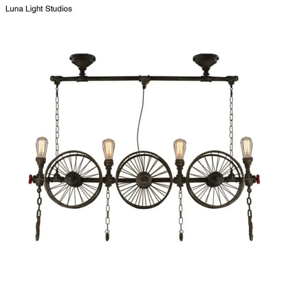 Decorbites™ industrial iron hanging light fixture in black with three bicycle wheels and four filament bulbs for living room