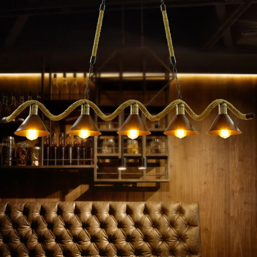 DecorBites industrial metal bistro island lighting with five black conical hanging shades and hemp rope suspension