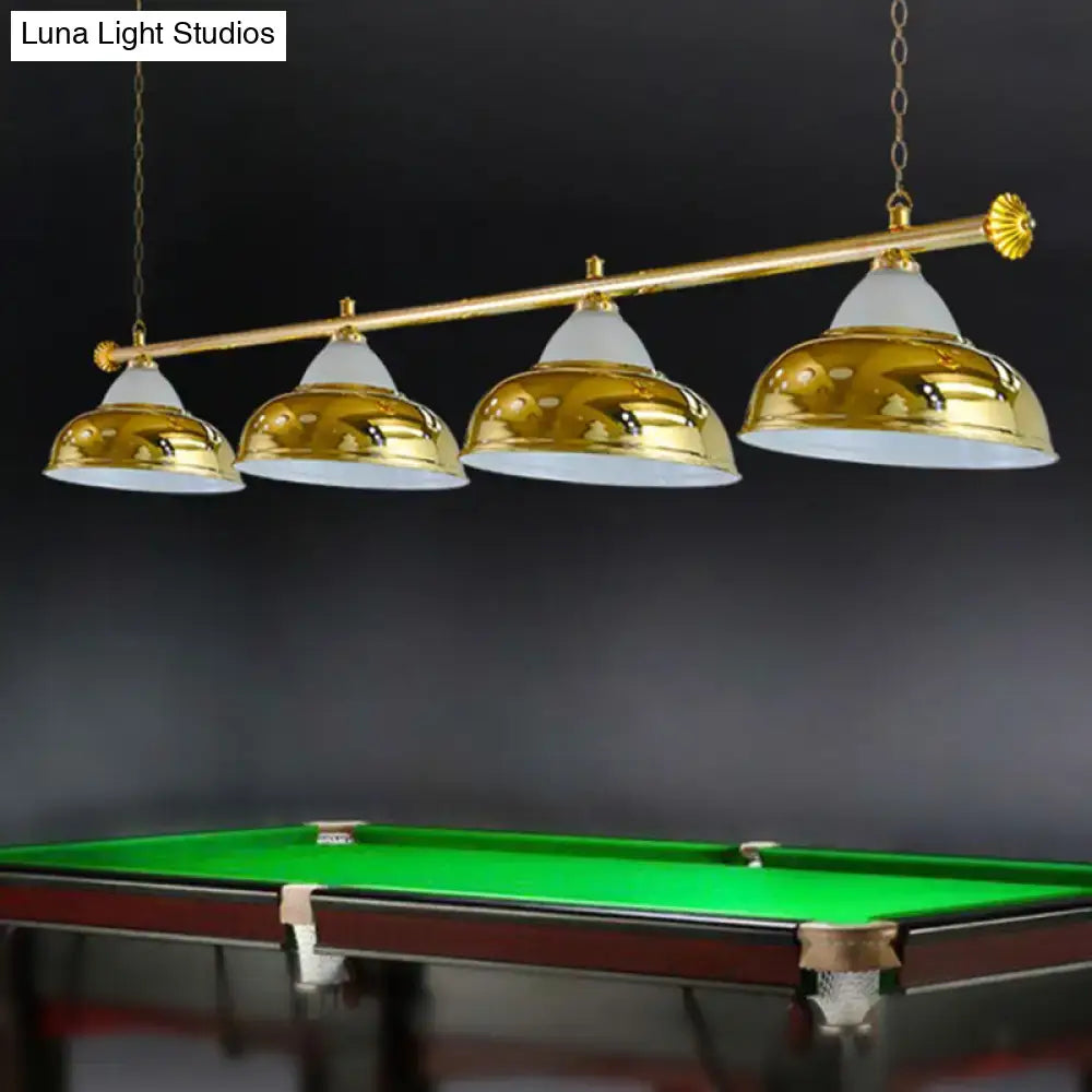 Gold-finished metal mirrored bowl suspended lighting fixture with four dome shades for billiard room decor