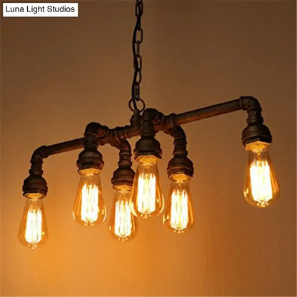 DecorBites™ industrial metal pipe pendant with five glowing amber led incandescent bulbs for dining room lighting