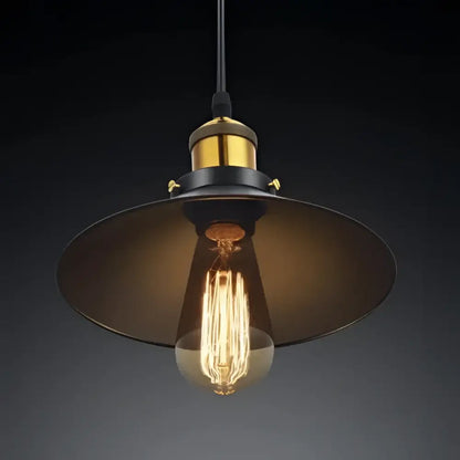 DecorBites™ industrial pendant lighting with black metal shade, brass accents, and exposed Edison bulb pendant light