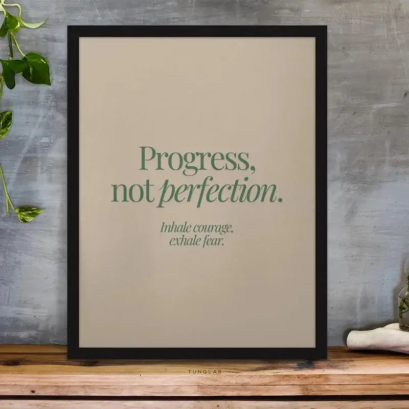 Black-framed decorbites™ inspirational quote poster with progress not perfection in muted green serif on beige background