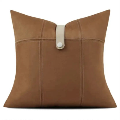 Tan suede throw pillow with cream leather strap and button closure from decorbites italian luxury pillowcase collection