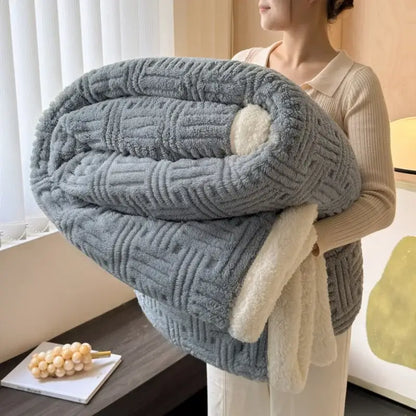A cozy light blue decorbites jacquard lamb wool double-layer blanket with textured woven pattern and soft white fleece lining