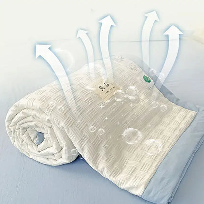 Cream-colored decorbites jacquard summer cool blanket with woven texture and light blue edges for bedroom use