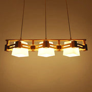 Warm-toned wooden pendant light with three cream trapezoid frosted glass shades for dining room 220v-240v led use