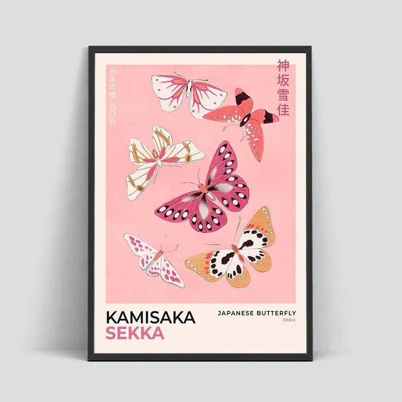 A framed DecorBites™ Japanese Hokusai art poster print with pink and orange butterflies on a soft pink home decor background