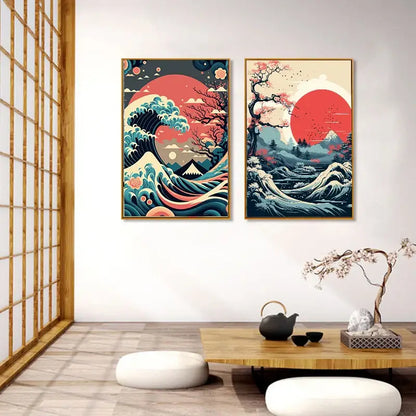 Two framed japanese vintage art canvases with stylized waves red suns and cherry blossoms in vibrant blue and pink tones