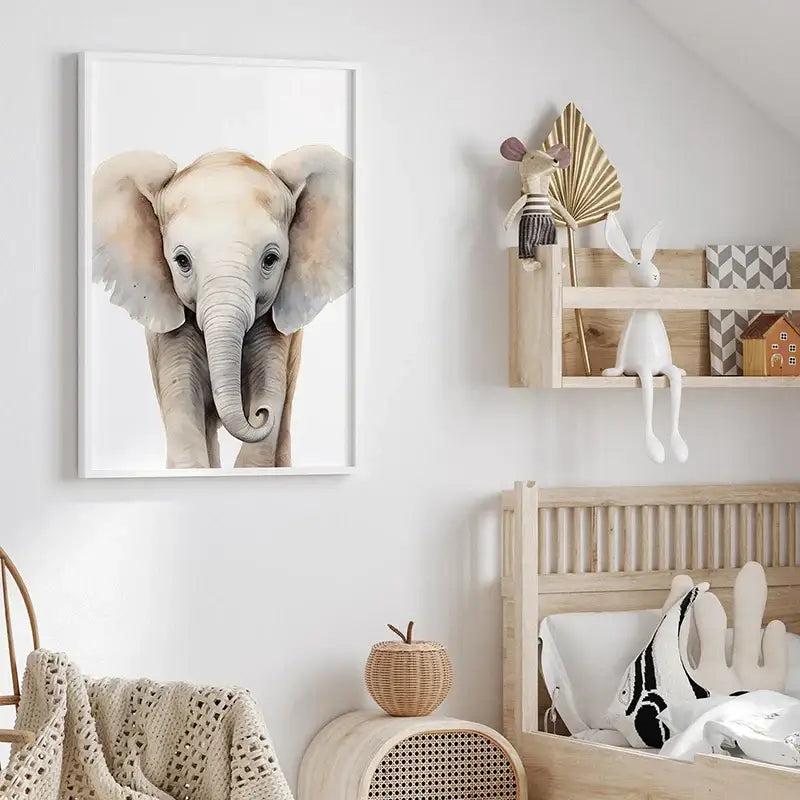 A framed watercolor painting of a baby elephant in soft beige and gray tones for animal nursery wall decor