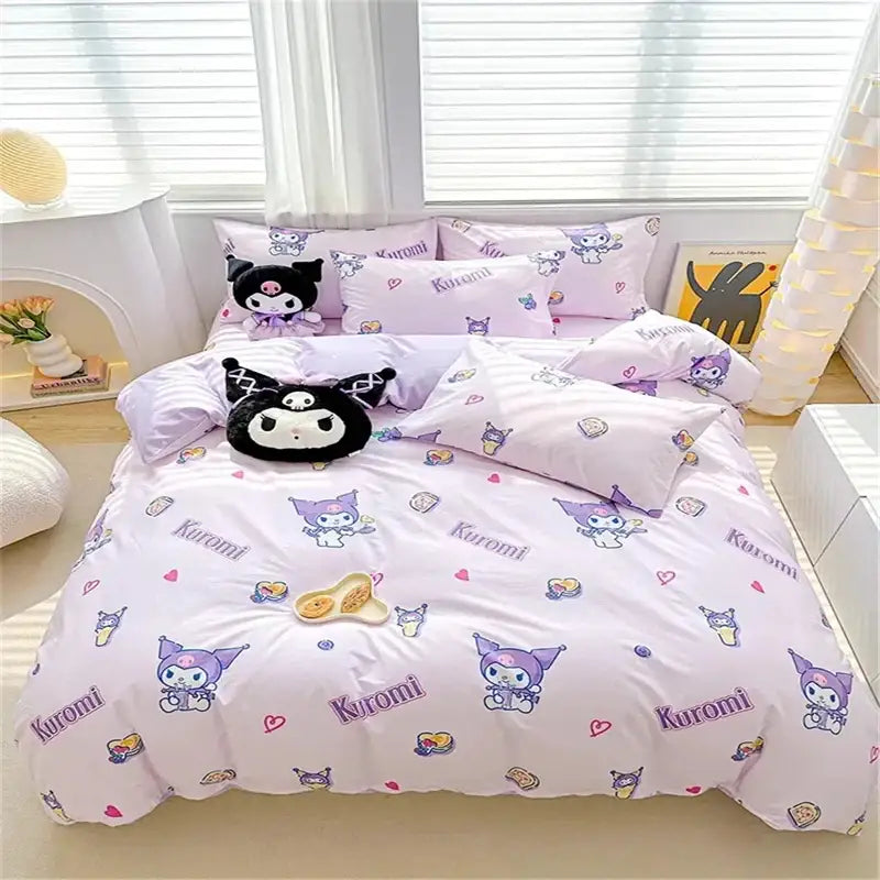 Pastel pink cinnamoroll bedding set with kuromi-themed duvet cover and plush black and purple character pillows