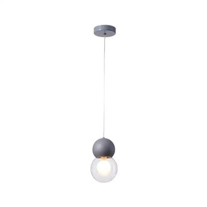 Decorbites kids bedside pendulum light with matte gray spherical top and clear globe macaron ceiling pendant