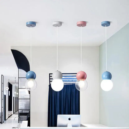 Decorbites kids bedside pendulum light with pastel macaron ceiling pendant in milky glass and matte tops in pink yellow blue