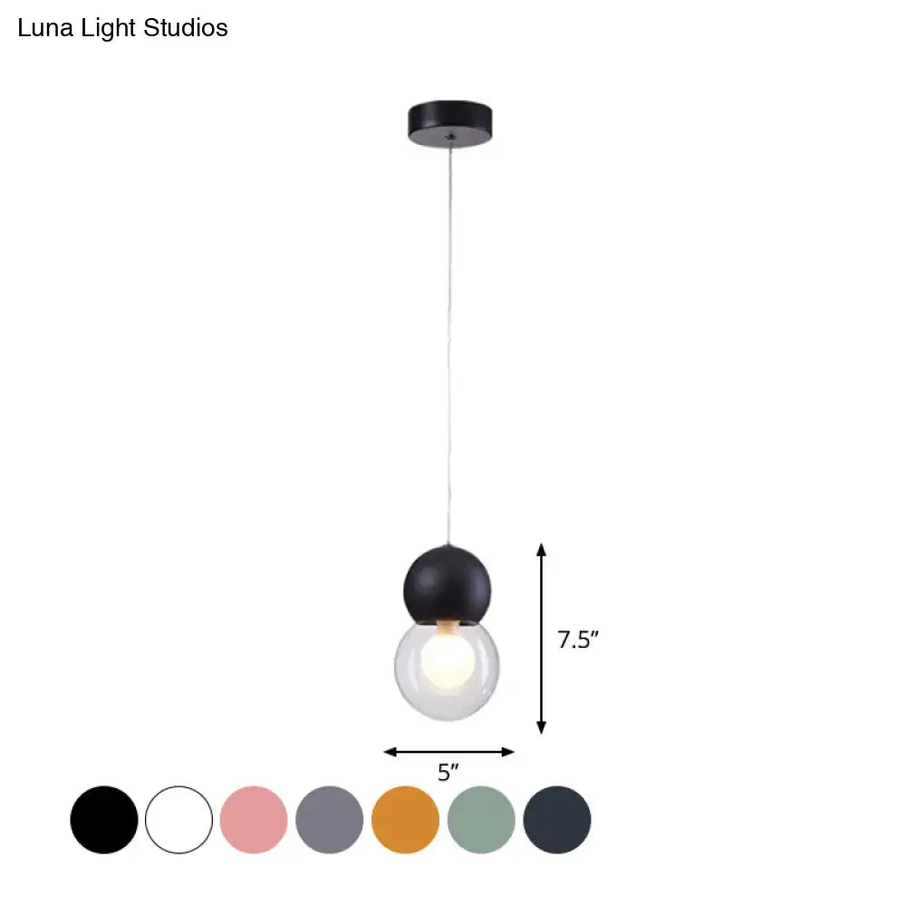 Black spherical kids bedside pendulum light with clear bulb, minimalist design, macaron ceiling pendant in multiple colors