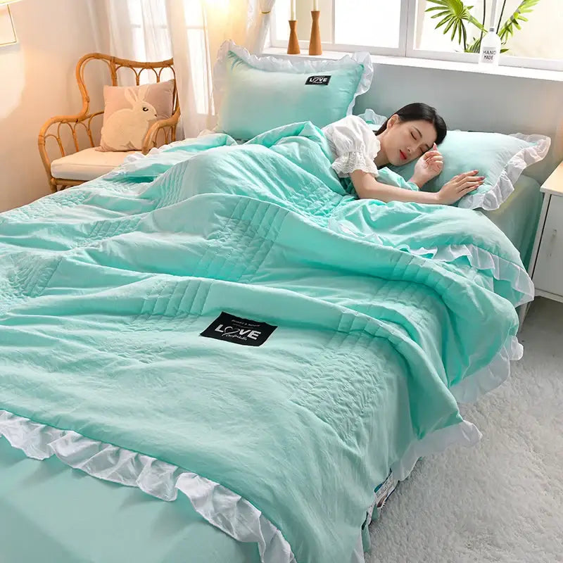 Mint green quilted summer quilt with white ruffled trim and black love patches from decorbites korean princess ruffles set