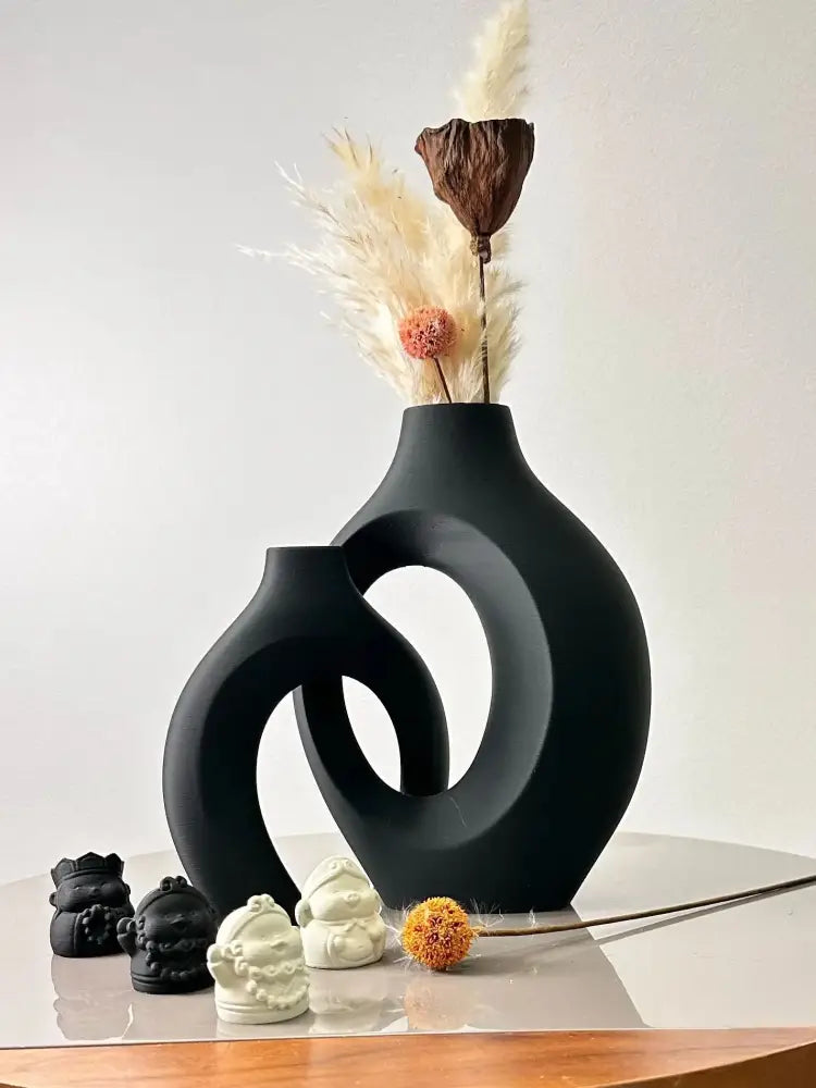 Black matte ceramic large dried vase with modern interlocking ring design from the DecorBites dried vase set for home