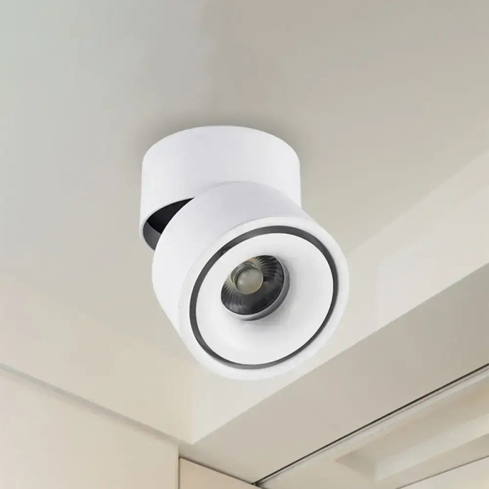 White cylindrical recessed spotlight with black accent ring and metallic shade suitable for bedroom color temperature control