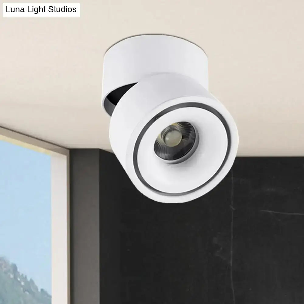 Modern black and white round led flush mount spotlight with metallic shade and adjustable color temperature for bedrooms