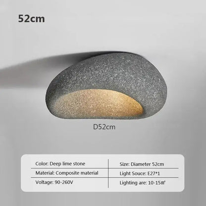 A sleek oval decorbites led ceiling light in textured deep lime stone composite with warm gold led glow for indoor use