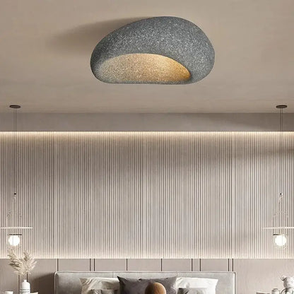 Gray textured stone-shaped decorbites led ceiling light with warm golden glow for indoor bedroom living room decor