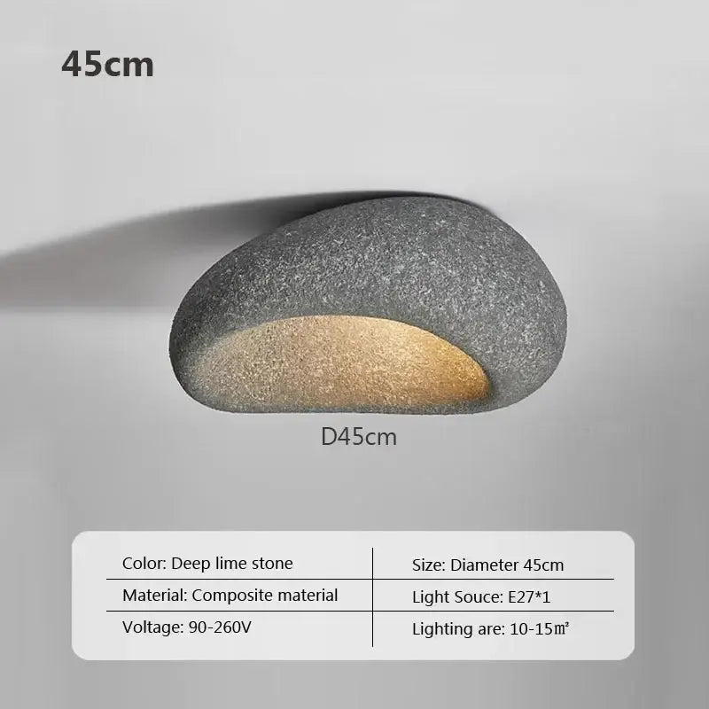 A sleek oval decorbites led ceiling light in deep limestone composite with warm led glow for indoor home decor