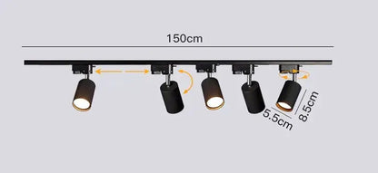 Black cylindrical decorbites led ceiling lights with adjustable heads mounted on a 150cm rail for indoor lighting