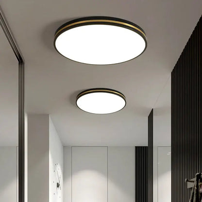 Modern circular ceiling light with black metal frame and gold trim from DecorBites led ceiling lights collection