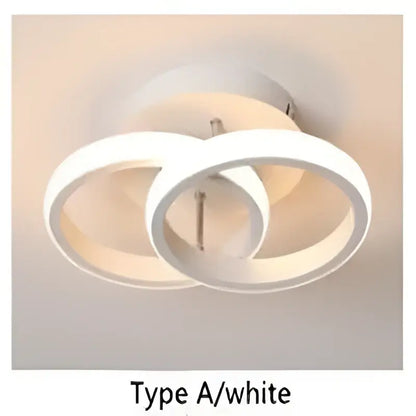 Black square decorbites led ceiling light with two interlocking white illuminated rings for modern home lighting